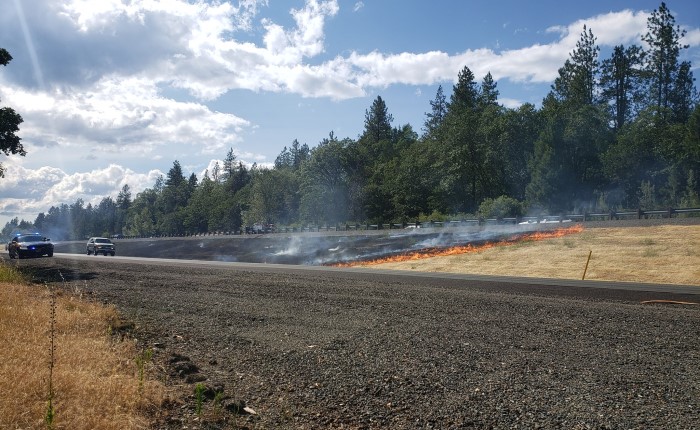 Grass fire starts along I-5 near US Cellular Community Park